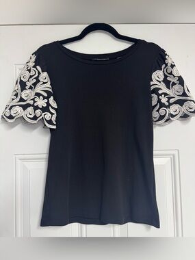 T Tahari Black Knit Top with White Floral Embroidered Puff Sleeves Small